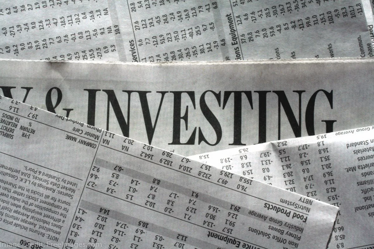 Investor reviewing portfolio on a laptop